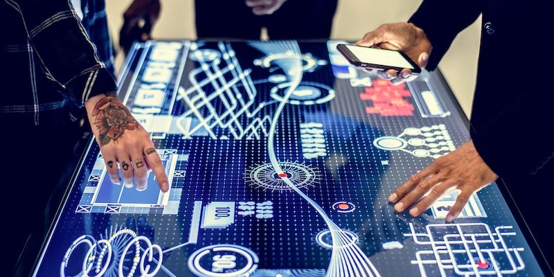 Technology meeting at cyber space table